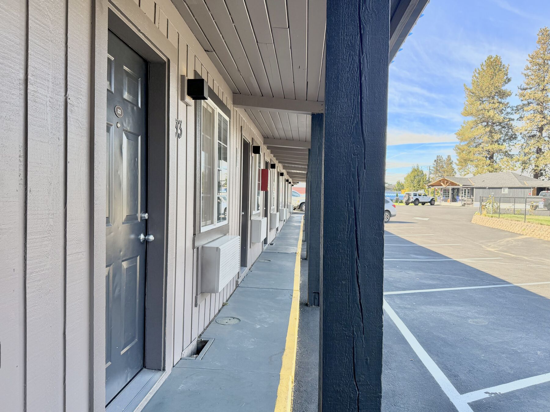 Covered walkway along the guest room doors